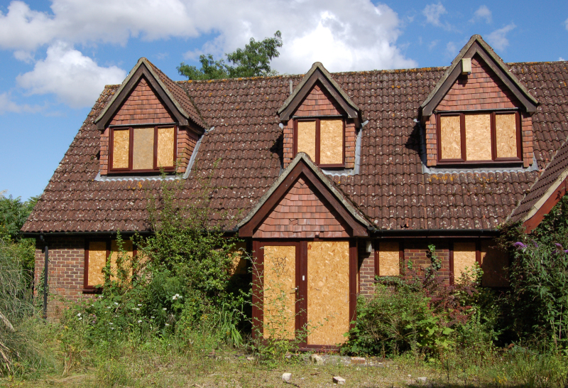 boarded-up house